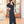 Load image into Gallery viewer, Black Jumpsuit w/Glitter Overlay
